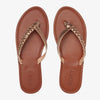 Sandalias Roxy Livia Bronze con tiras doradas trenzadas y pin roxy con suela marron