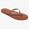Sandalias Roxy Livia Bronze con tiras doradas trenzadas y pin roxy con suela marron